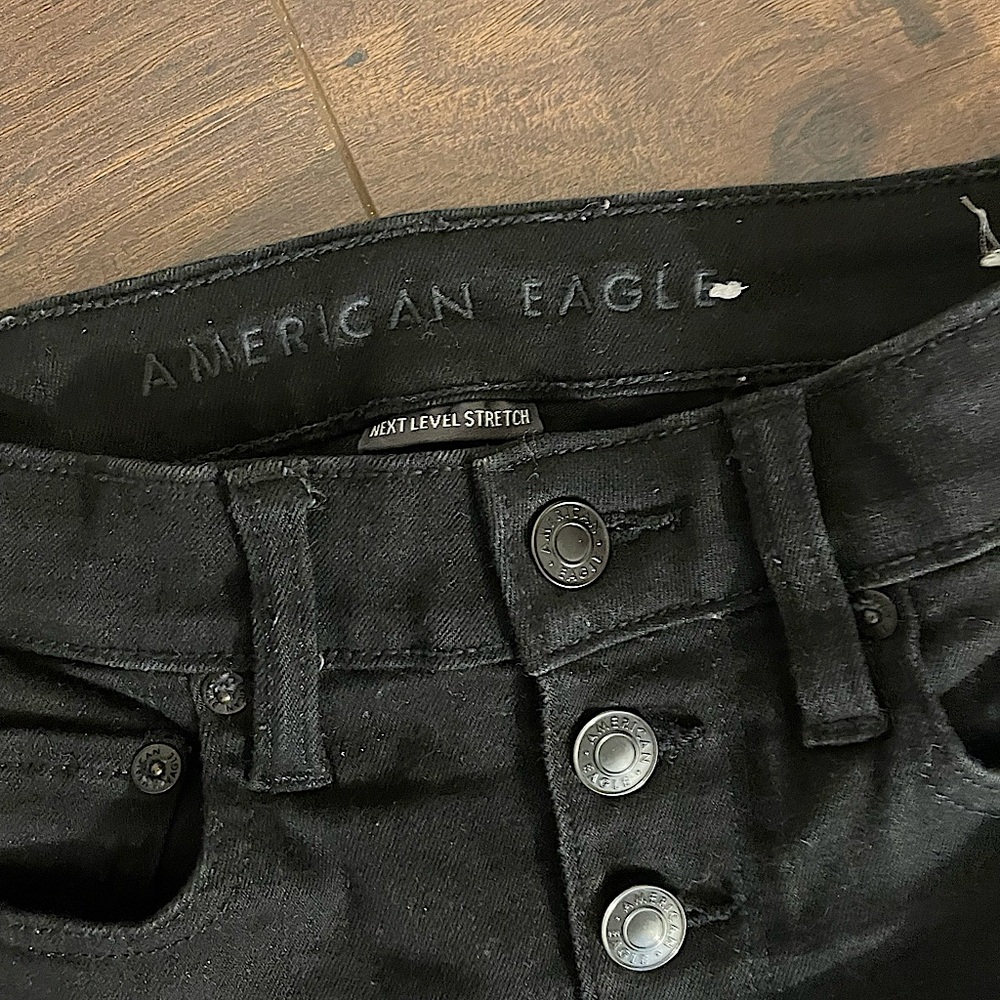 American Eagle Next Level Stretch Flare High Rise Jean black.